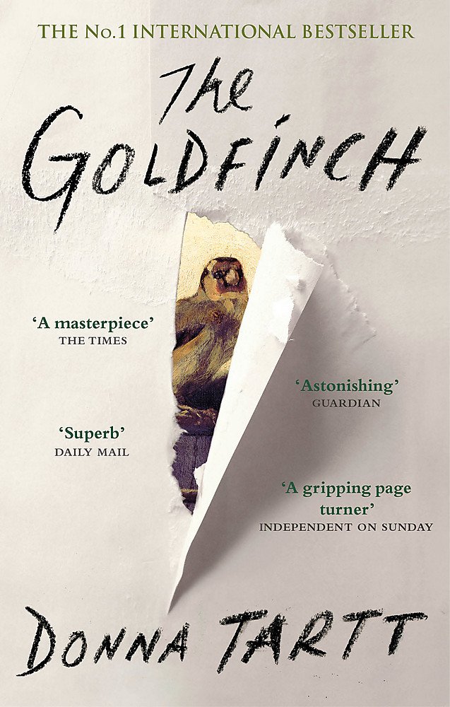 Cover of The Goldfinch by Donna Tartt
Painting 'The Goldfinch' obscured by paper wrapping; tear in the paper revealing only the bird in the painting